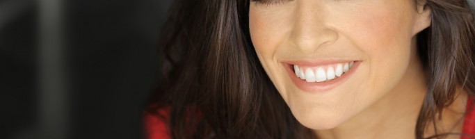 Happy portrait of a young smiling young woman
